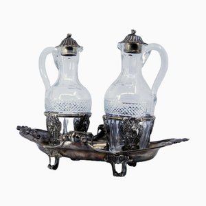 Nave-Shaped Silver and Cut Glass Cruet with Mascarons and Hollow Feet, Set of 3
