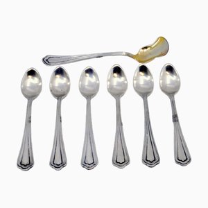 Silberne Kaffeelöffel und Zuckerschaufel mit goldenen Muscheln und Ziergriffen, 6 . Set