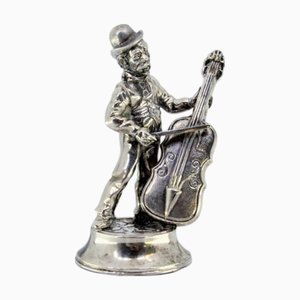 Silberner Musiker, der Cello spielt