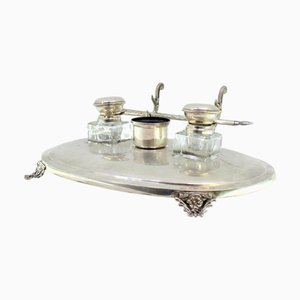 Elliptical Silver and Glass Inkwell with Pen Holder and Cut-Out Feet