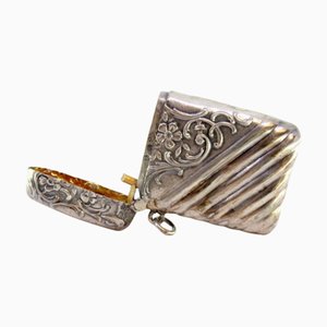 Silver Matchbox with Raised Floral Motifs and Hanging Ring