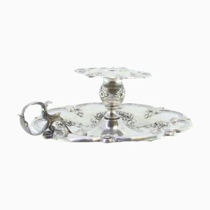 Silver Paddle with Raised Floral Motifs and Acanthus Leaf Applications
