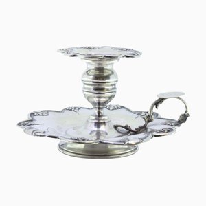 Silver Paddle with Raised Floral Motifs