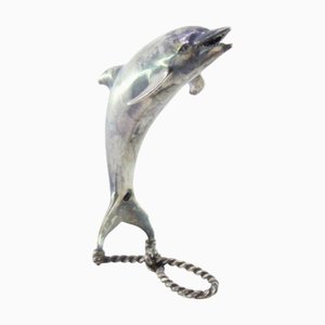 Delfino in alpacca in appoggio con base a forma di corda