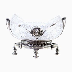 Obstschale aus Silber und geschliffenem Glas mit Reliefmasken und Applikationen