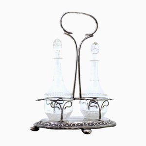 Glaslikör Set auf Silberrahmen mit geprägten Blumenmotiven und runden Füßen, 3er Set