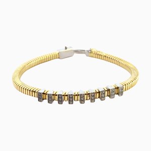 Bracelet en or bicolore avec bandes malléables et zircones