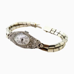 Montre en Or et Platine avec Boîtier Découpé, Diamants Taille Brillant et Bracelet Double Parallèle