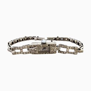 Montre en Platine avec Diamants Taille Brillant, Bracelet articulé et Chaîne de Sécurité