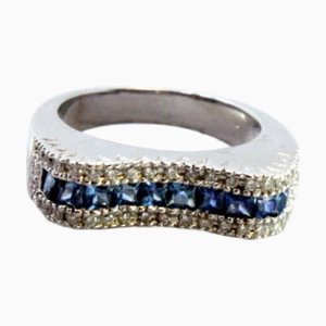 Bague en Or avec Diamants Taille Brillant et Topazes Bleues Centrales