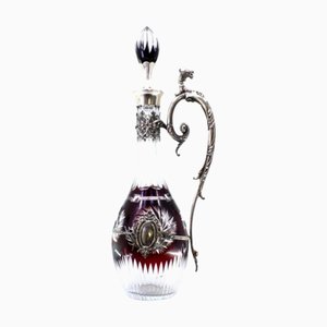 Glasflasche in Silber und Rot mit Monogrammkarte