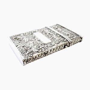 Silver Cardboard Box with Revealed Floral Motifs