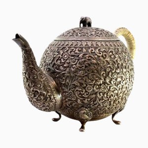 Silver Kettle with Embossed Floral and Plant Motifs