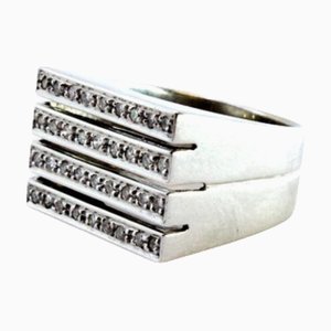 Bague en Or Blanc avec Quatre Bandes de Diamants Taille Brillant et Table Plate