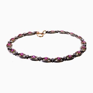 Armband aus Gold und Silber mit kalibrierten synthetischen Rubinen