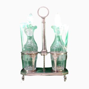 Silver and Cut Glass Cruets Cruet with Friezes, Raised Floral Motifs and Claw-Shaped Feet, Set of 3