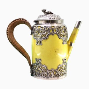Porcelain Kettle with Silver-Cut Structure, Reliefs and Coated Handle with Flower-Shaped Hinged Lid Knob