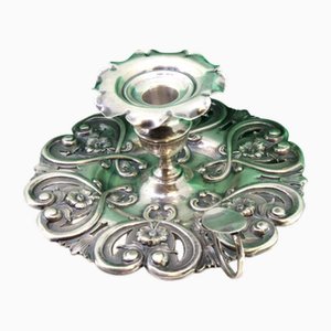Silver Paddle with Floral Motifs and Smooth Handle