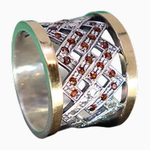 Ring aus Gold und Silber mit eingelegten Granaten