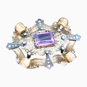 Goldbrosche mit Diamantreliefs und Chips