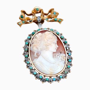 Gold Brooch with Tilting Cameo