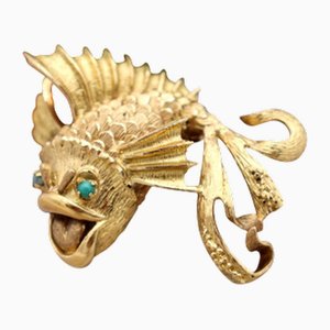 Goldene fischförmige Brosche