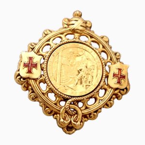 Goldbrosche mit drehbarem Zentrum