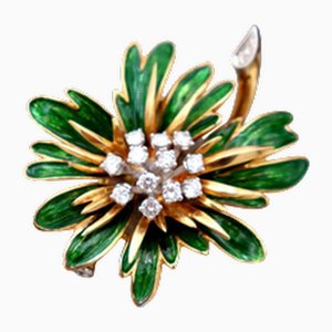 Goldene Brosche in Blumenform