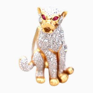 Goldene Brosche in Leopardenform mit Diamanten