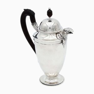 Silberne Kaffeekanne mit Griff und Knopf aus Kastanienholz