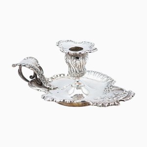 Silbernes Paddel mit Blumenmotiven