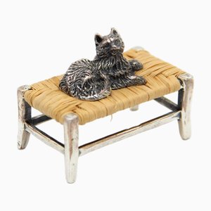 Miniature Silver Cat Lying on Table