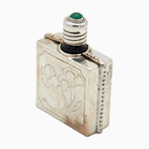 Silberne Parfümflasche mit gravierten Blumenmotiven