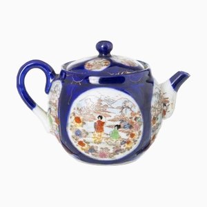 Hervidor con tapa de porcelana