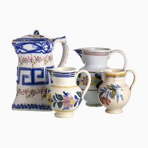 Fayence Tassen, 4 . Set
