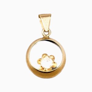 Anhänger aus 18 Karat Gold mit weißem Stein