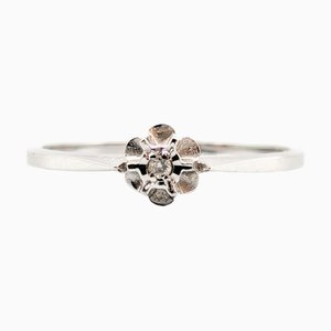 Anillo solitario de oro con diamantes
