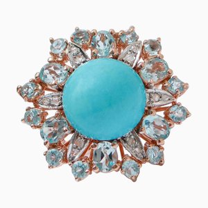 Anillo de plata y oro rosa de 18 kt con topacios aguamarina, magnesita y diamantes
