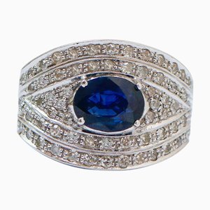 18 Karat White Gold Band Ring with Sapphire and Diamonds
