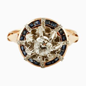 Ring aus 18 Karat Roségold und Silber mit Diamanten und Saphiren