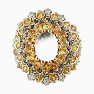 18 Karat Rose Gold Ring with Central Blue Sapphire, Blue and Yellow Sapphires and Diamonds