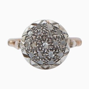 Bague en or rose et argent avec diamants