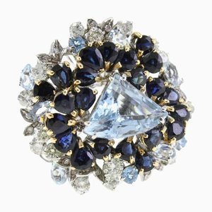Anillo de oro de 18 kt en dos colores con aguamarina y diamante