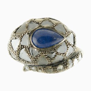 18 Karat Rose Gold and Silver Snake Ring with Diamonds and Tanzanite