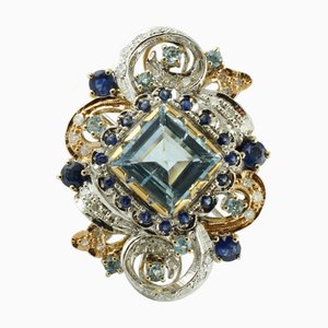 18 Karat Rose and White Gold Ring with Topaz, Aquamarine and Sapphires