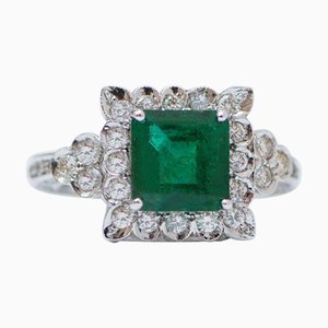 Platinum Ring with Emerald and Diamonds