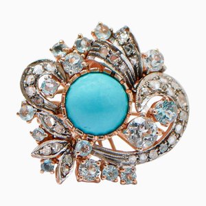 Ring aus Roségold und Silber mit Magnesit und Topasen und Diamanten