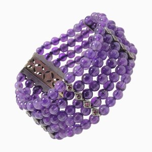 Armband mit Amethystperlen, Diamanten, Rubinen und Gold