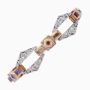 Armband aus 14kt Gold mit Diamanten und Granaten