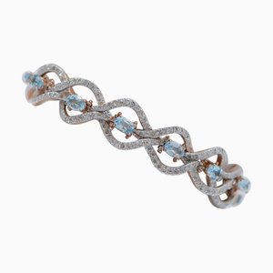 Rose Gold and Silver Bracelet with Aquamarine Color Topaz and Diamonds